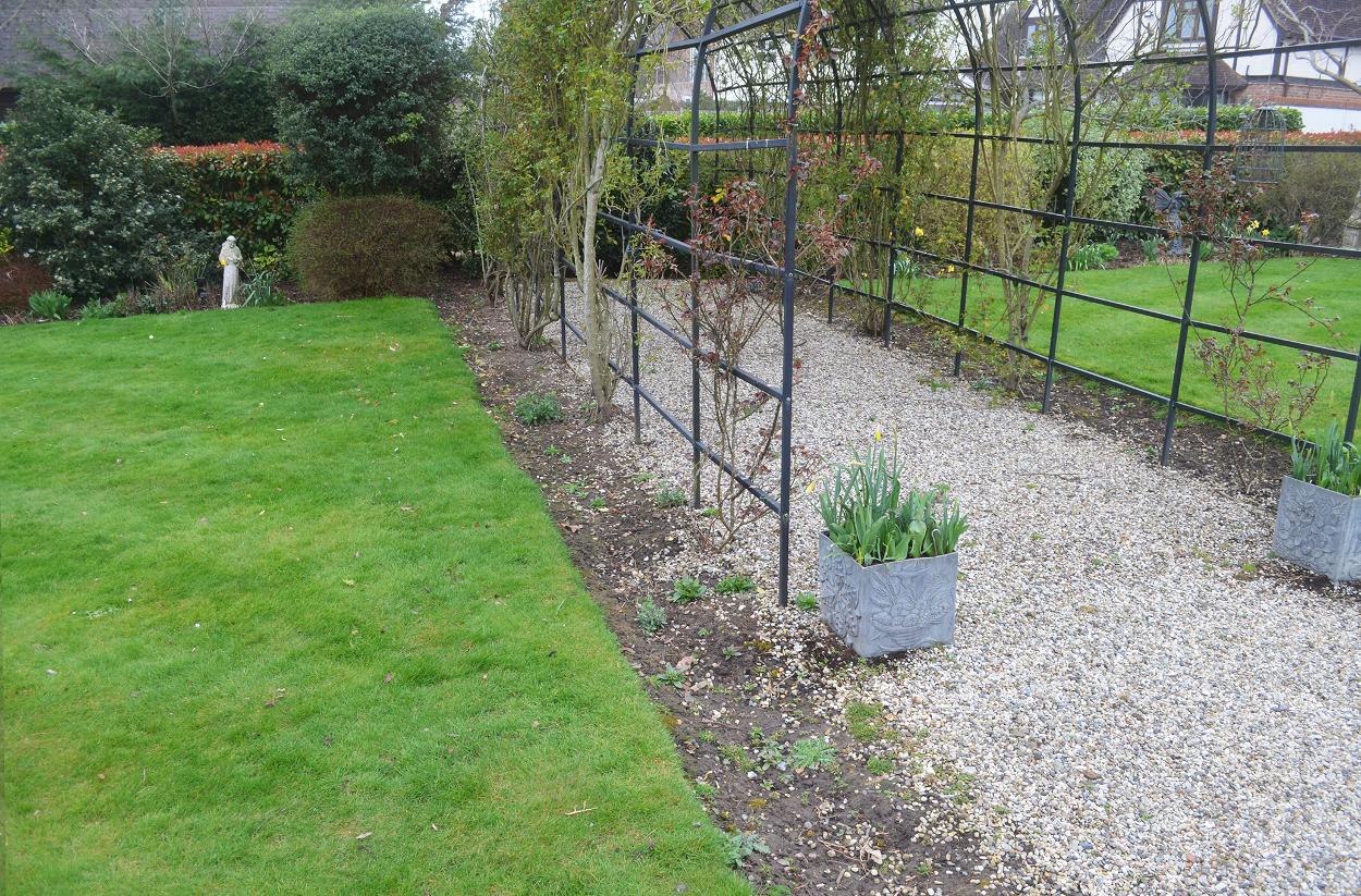 Garden design in Essex and Suffolk steel archway
